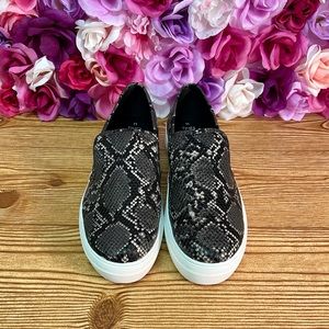 Slip on snake skin shoes